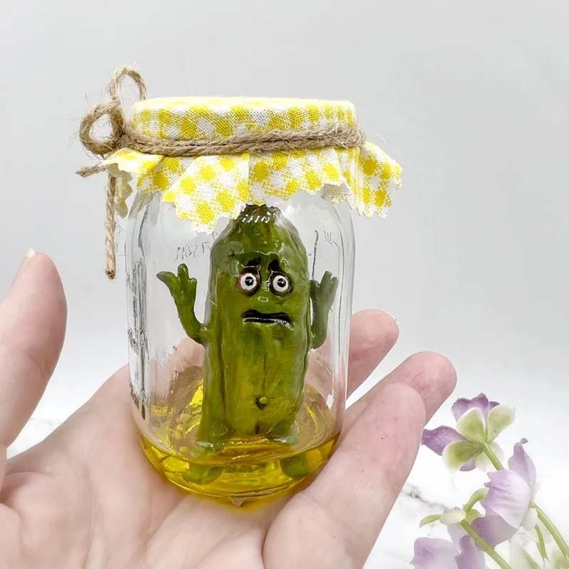 Grumpy Pickle in a Jar sculpture